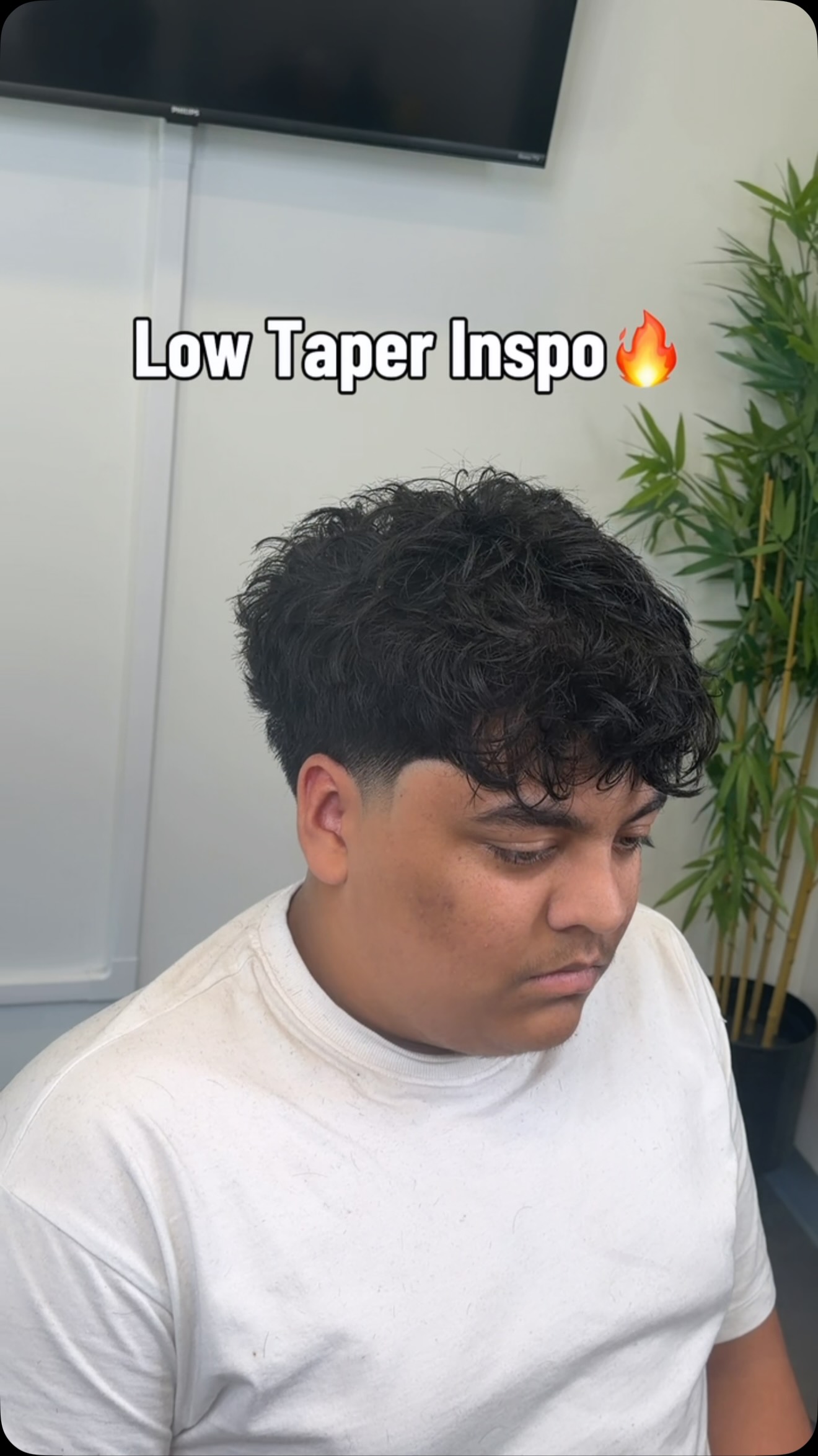 Chris’s recent textured low taper with a curly fringe